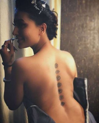Pavitra Punia Back tattoo